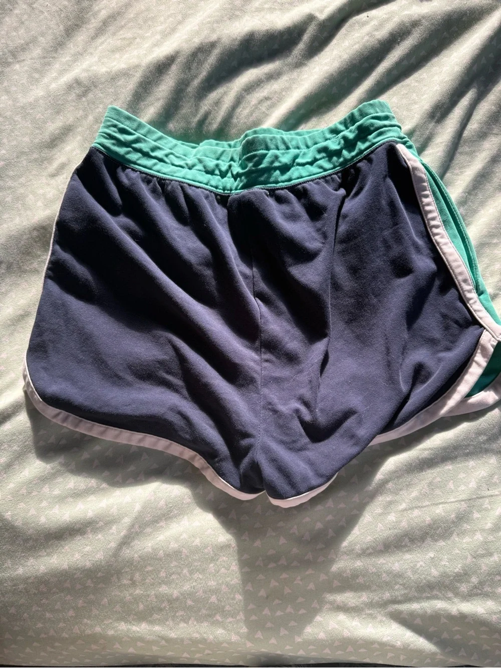 Nike Women's Teal front and navy back Athletic Shorts with White Trim